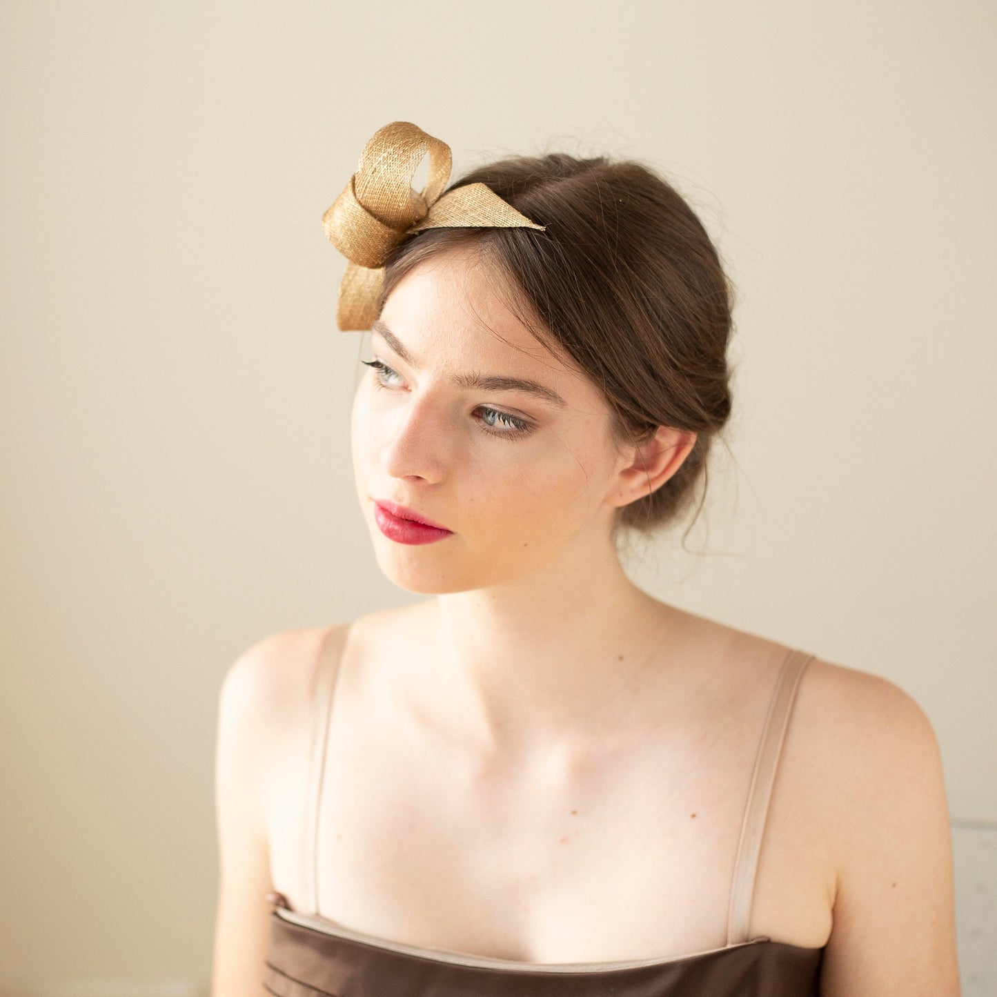 Metallic Gold Bow Fascinator: Elegant Sinamay Headpiece