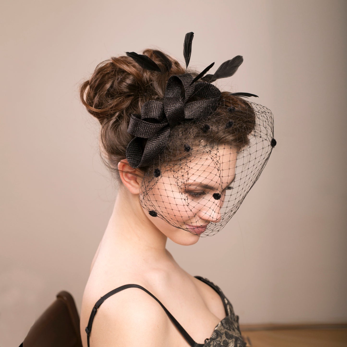 Black Feathered Fascinator with Birdcage Veil: Women's Elegant Headpiece