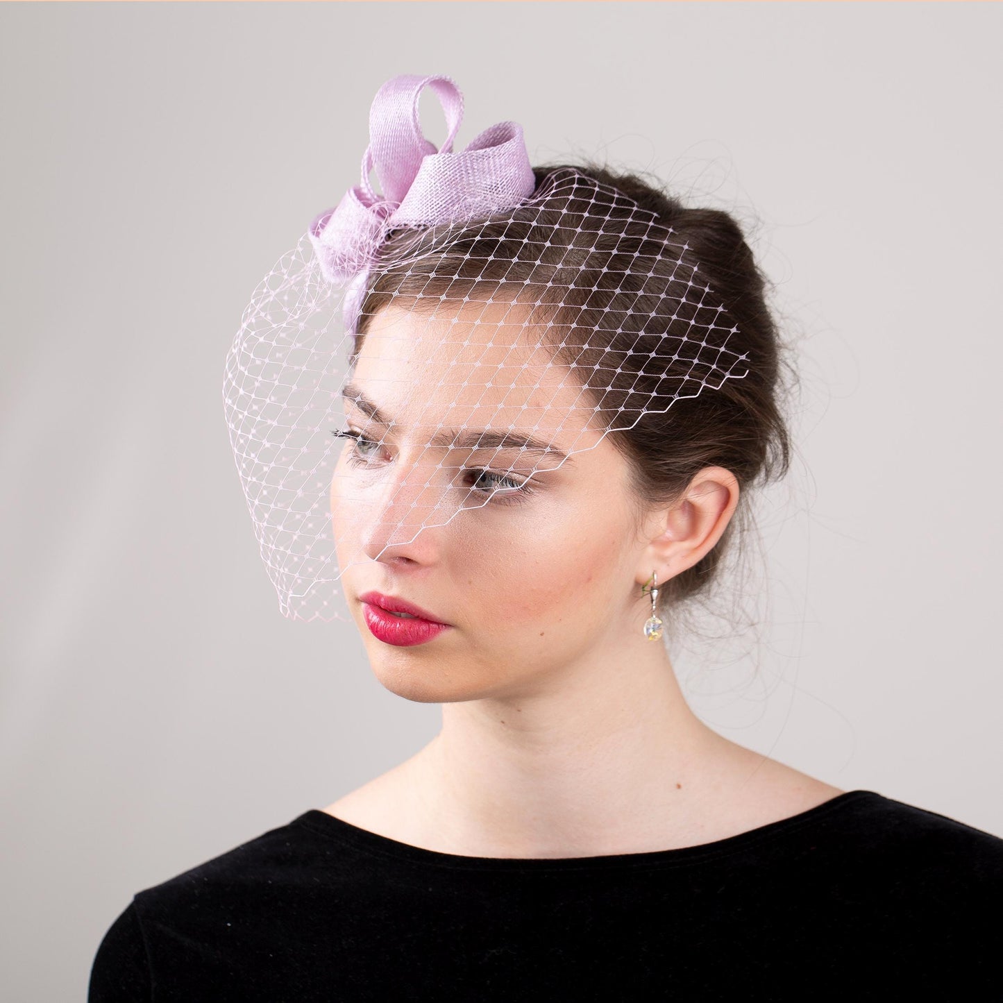 Wedding guest bow headpiece with birdcage in lilac modern veil and minimalist fascinator hair accessory in custom colours