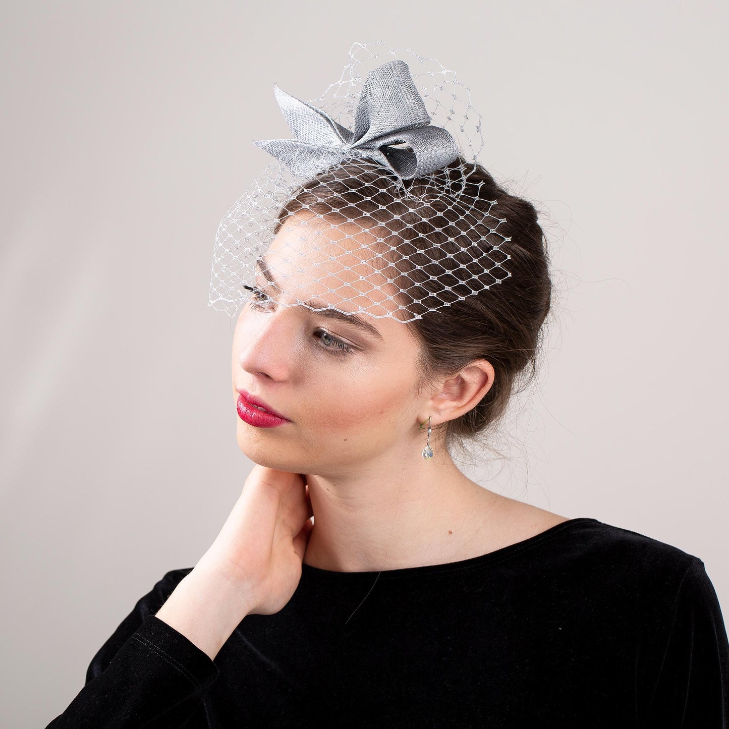 Silver Bow Fascinator: Metallic Wedding Headpiece with Birdcage Veil