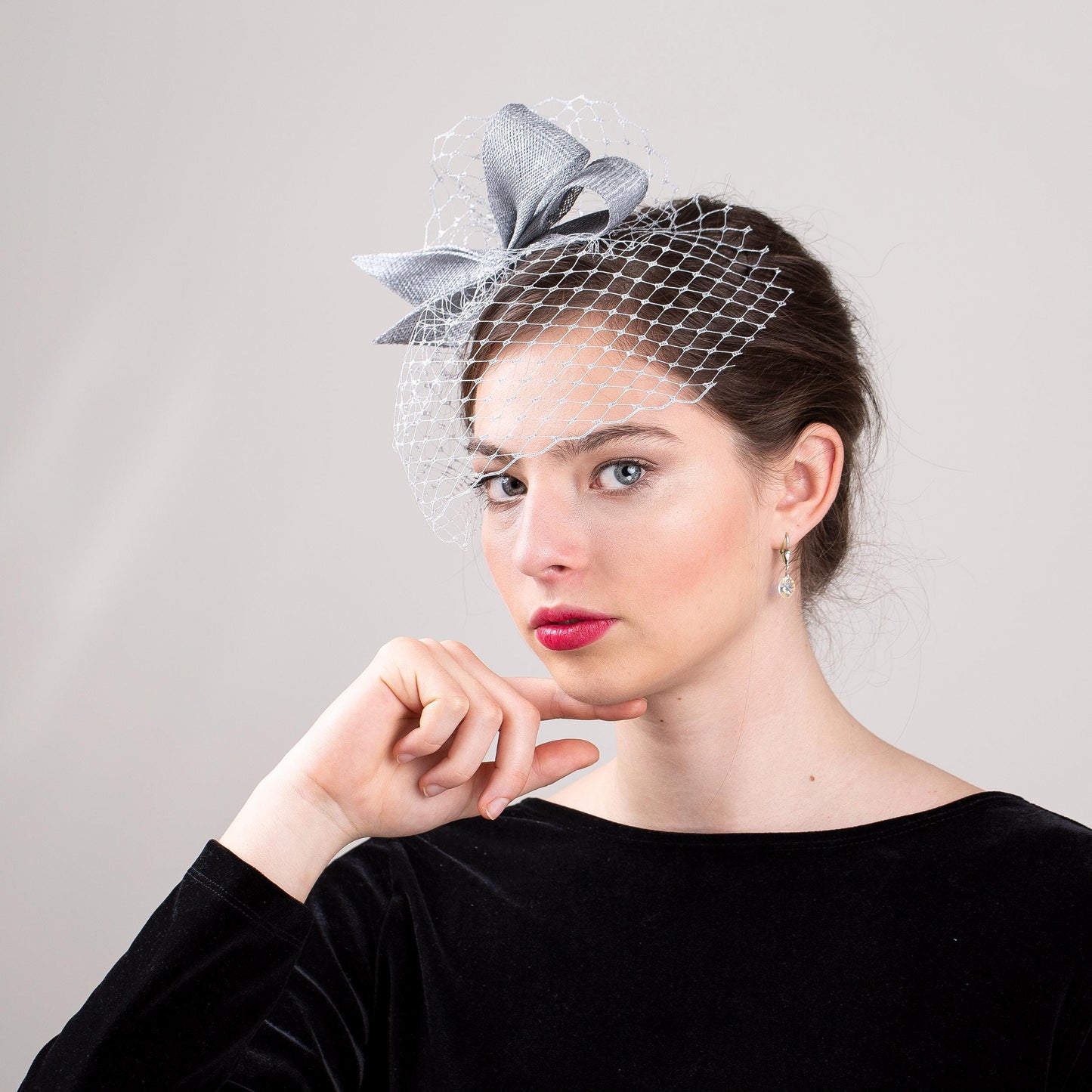 Silver Bow Fascinator: Metallic Wedding Headpiece with Birdcage Veil