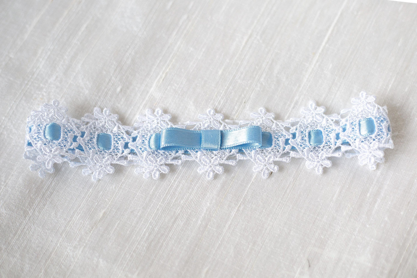 Bridal bow lace garter, Wedding lace blue bow garter, something blue garter with interwoven ribbon, floral lace white garter with blue bow