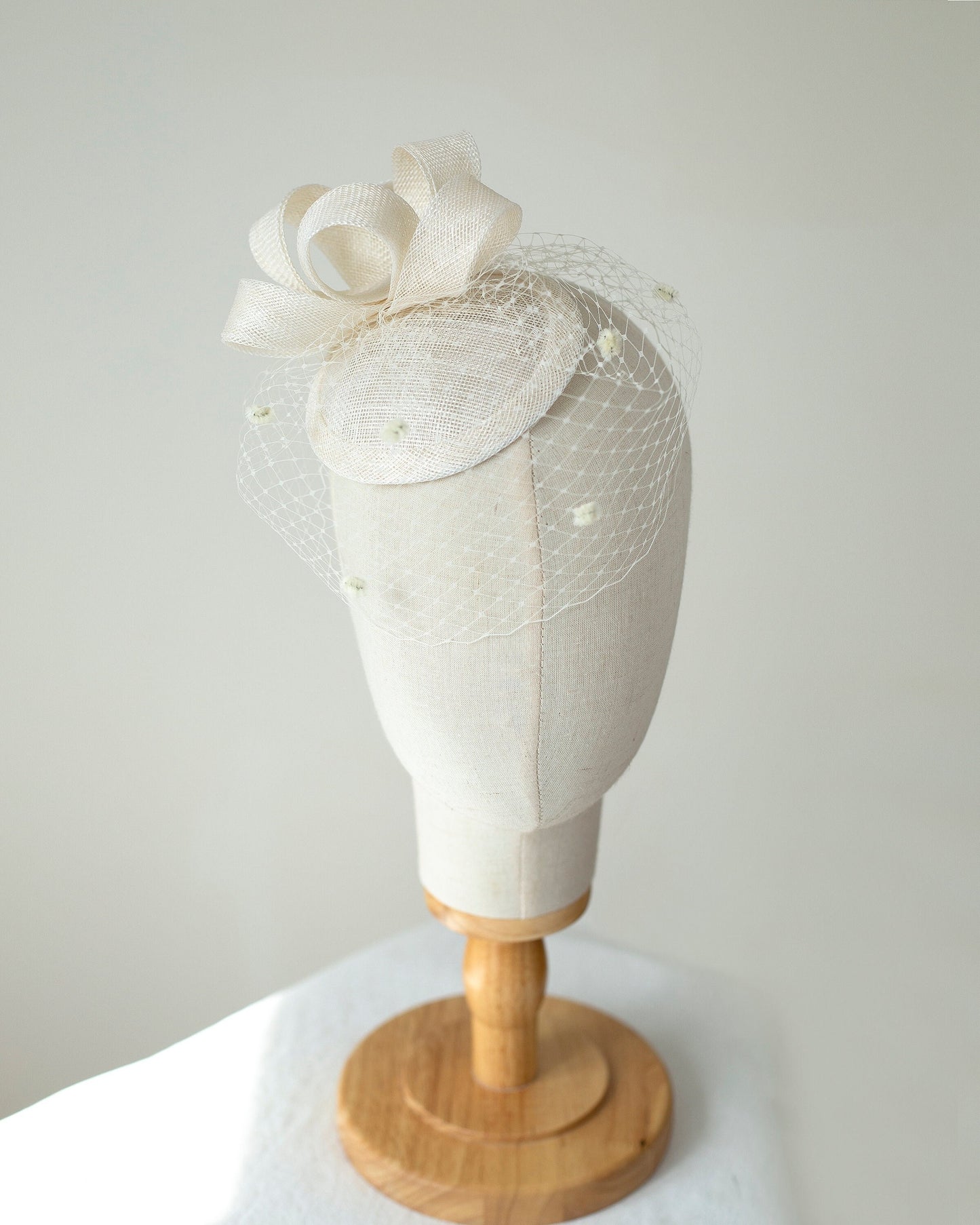 Bridal Sinamay Fascinator Hat in Ivory Wedding Pillbox Hat with Dotted Birdcage Veil