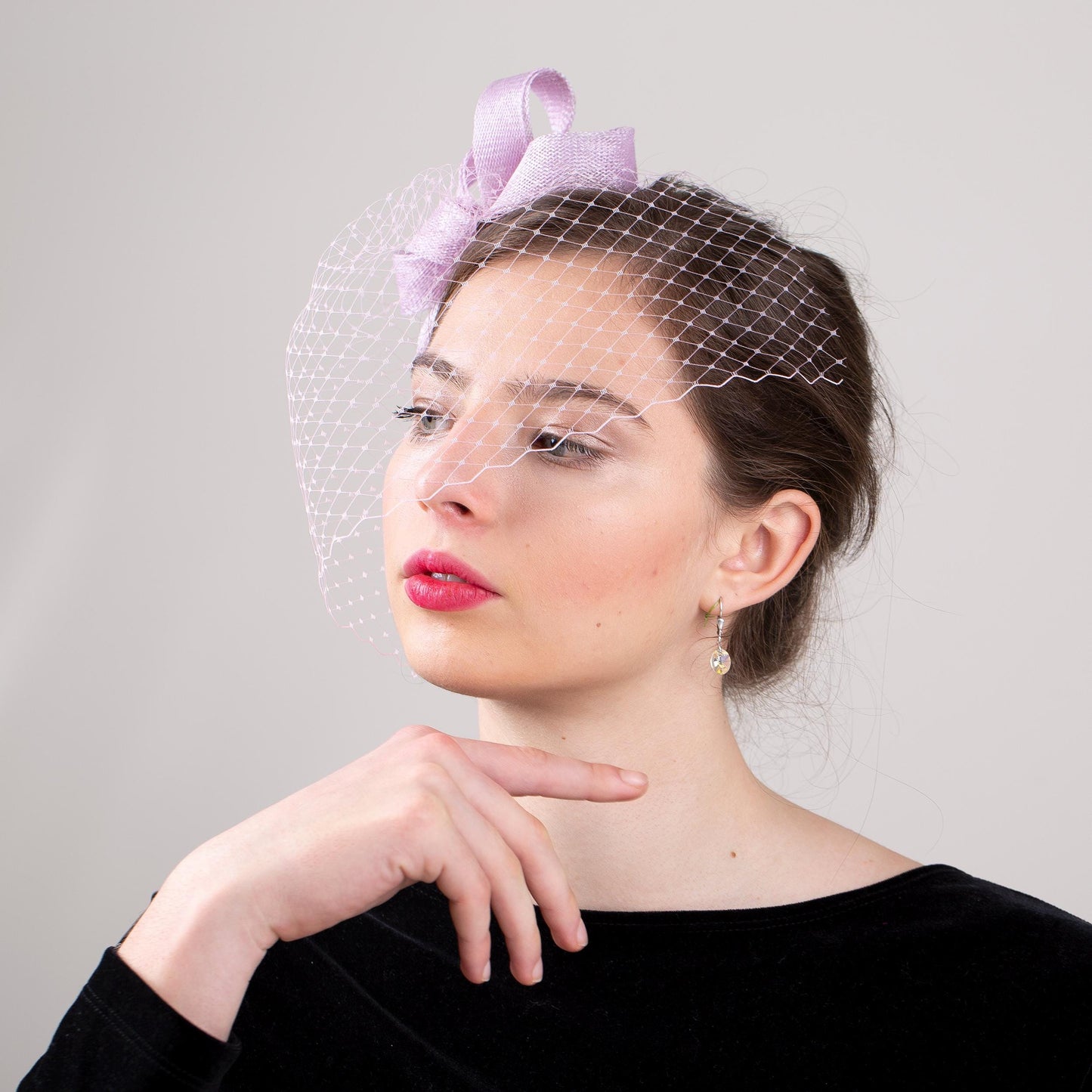 Wedding guest bow headpiece with birdcage in lilac modern veil and minimalist fascinator hair accessory in custom colours