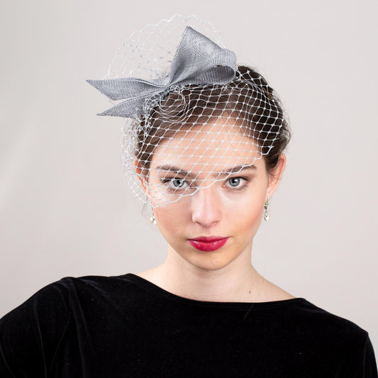 Silver Bow Fascinator: Metallic Wedding Headpiece with Birdcage Veil