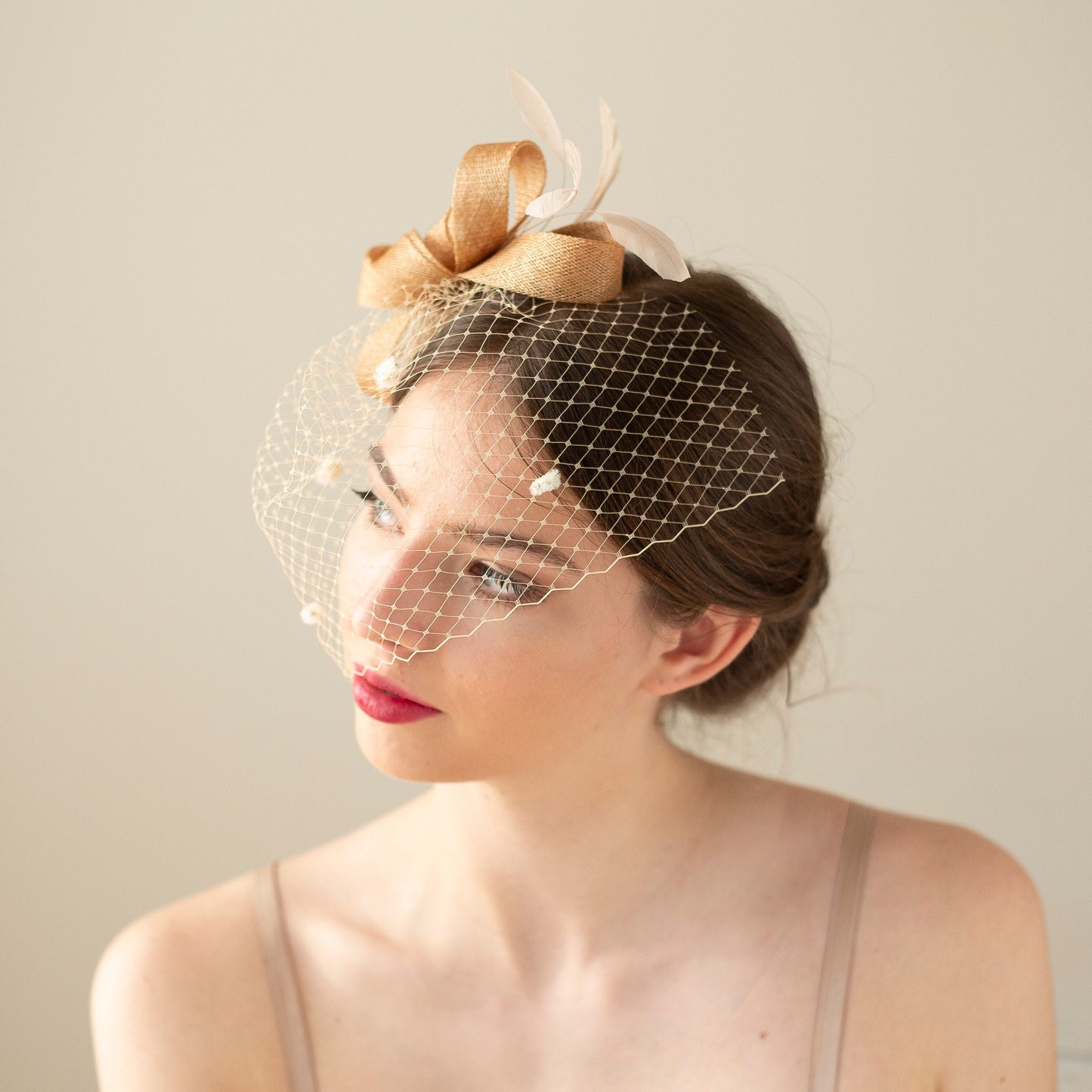 Beige Bridal Bow Fascinator, Feather & Birdcage Veil Headpiece