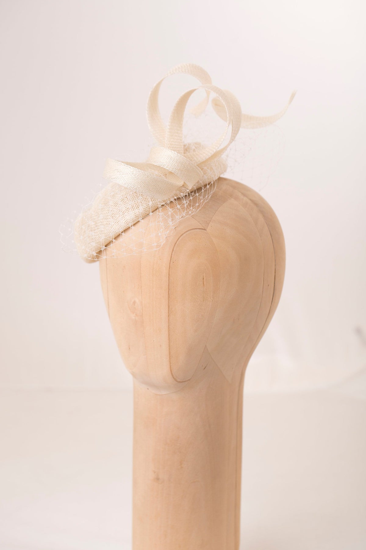 Ivory Bridal Pillbox Hat: Veiled Cocktail Millinery Fascinator with Sculptural Swirls