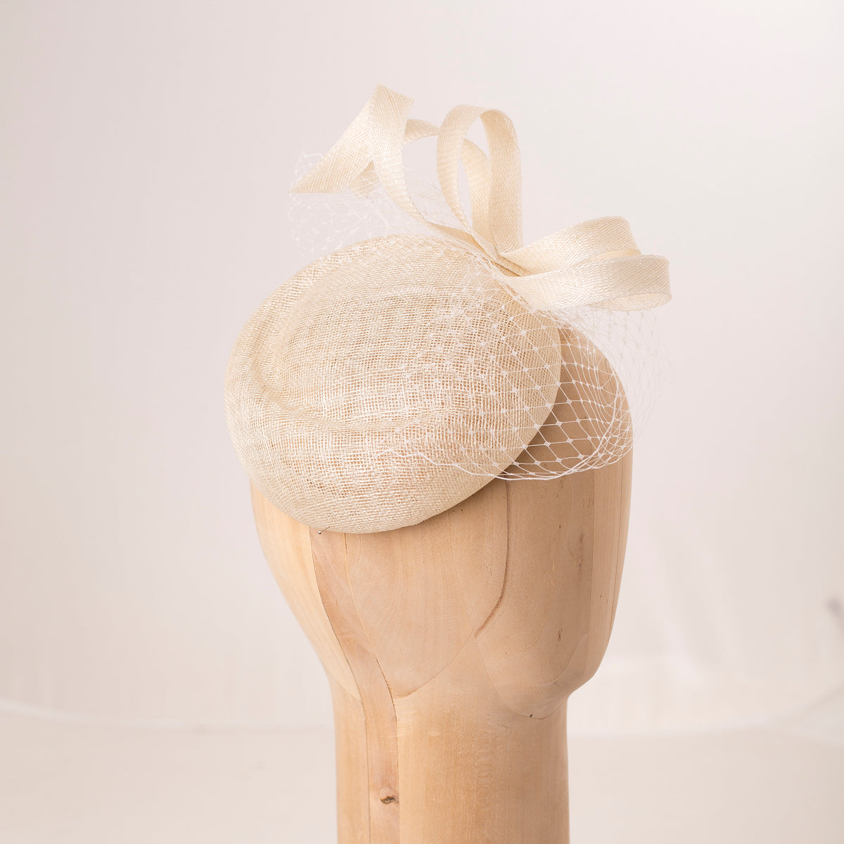 Ivory Bridal Pillbox Hat: Veiled Cocktail Millinery Fascinator with Sculptural Swirls