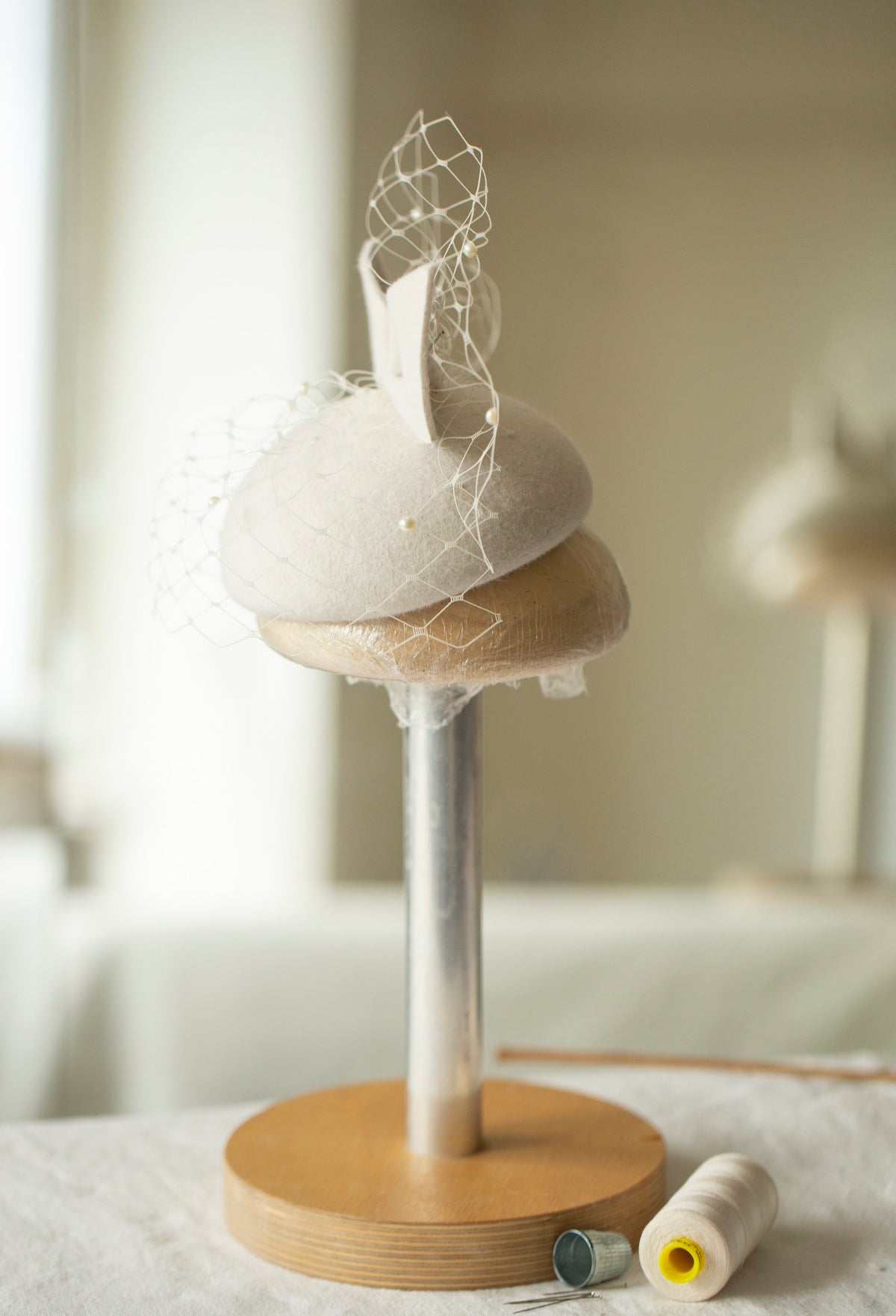 Ivory Felt Bridal Bow Pillbox Hat with Pearl-Embellished Birdcage Veil – Contemporary Wedding Headpiece