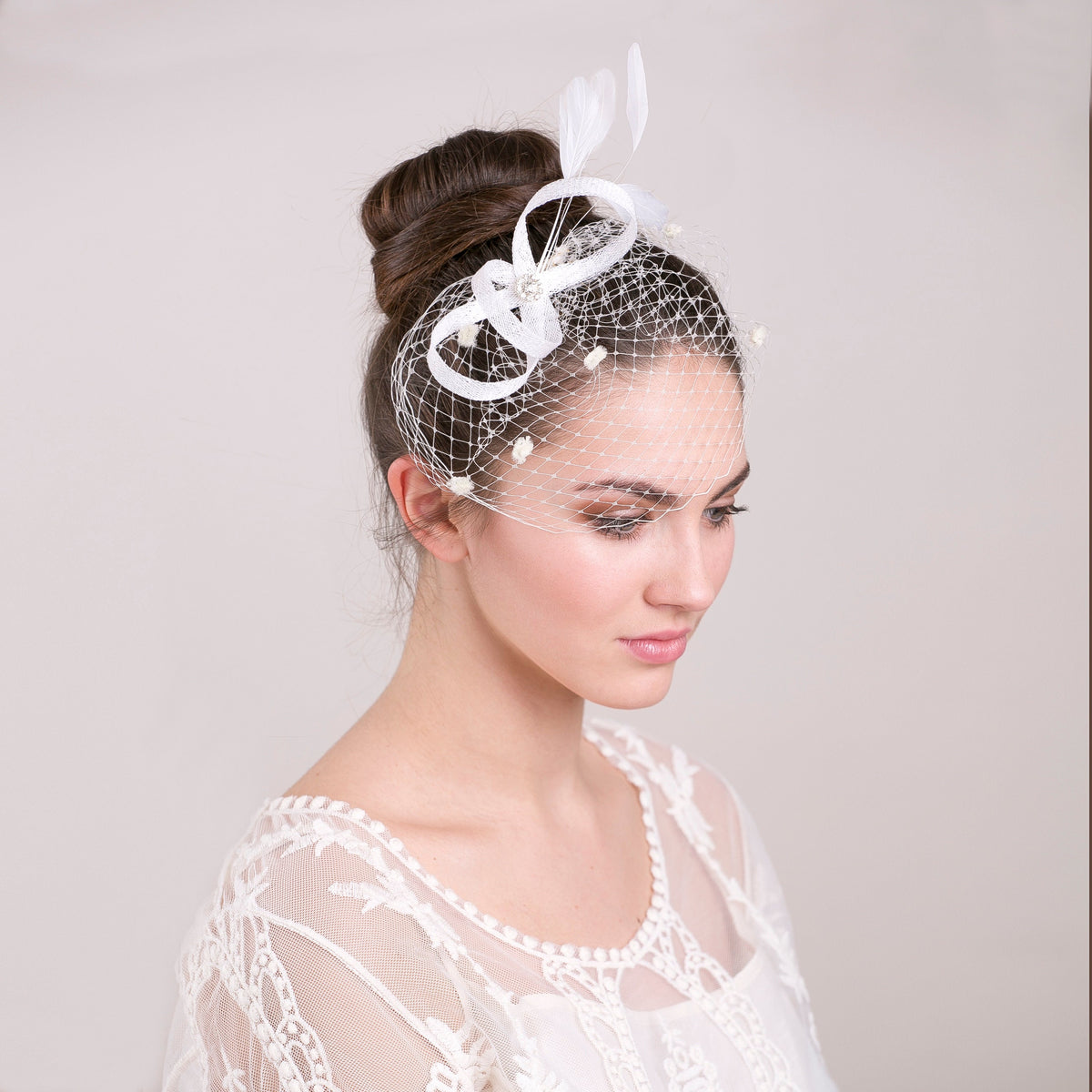 Bridal Feather Fascinator: Dotted Birdcage Veil, Rhinestone Center