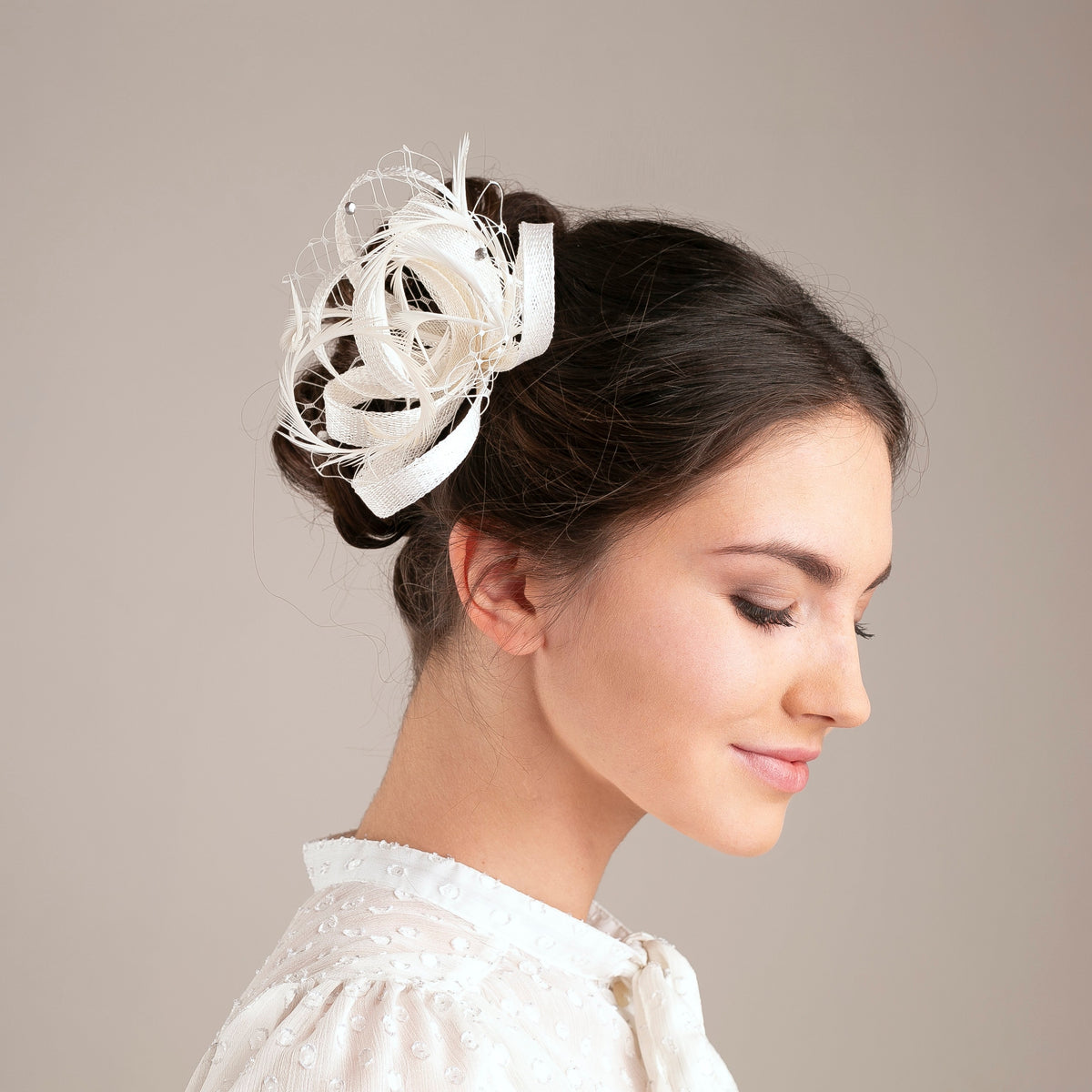 Feather & Veiling Wedding Fascinator: Romantic Bridal Headpiece in White with netting accent