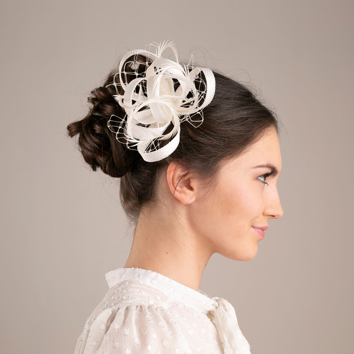 Feather & Veiling Wedding Fascinator: Romantic Bridal Headpiece in White with netting accent