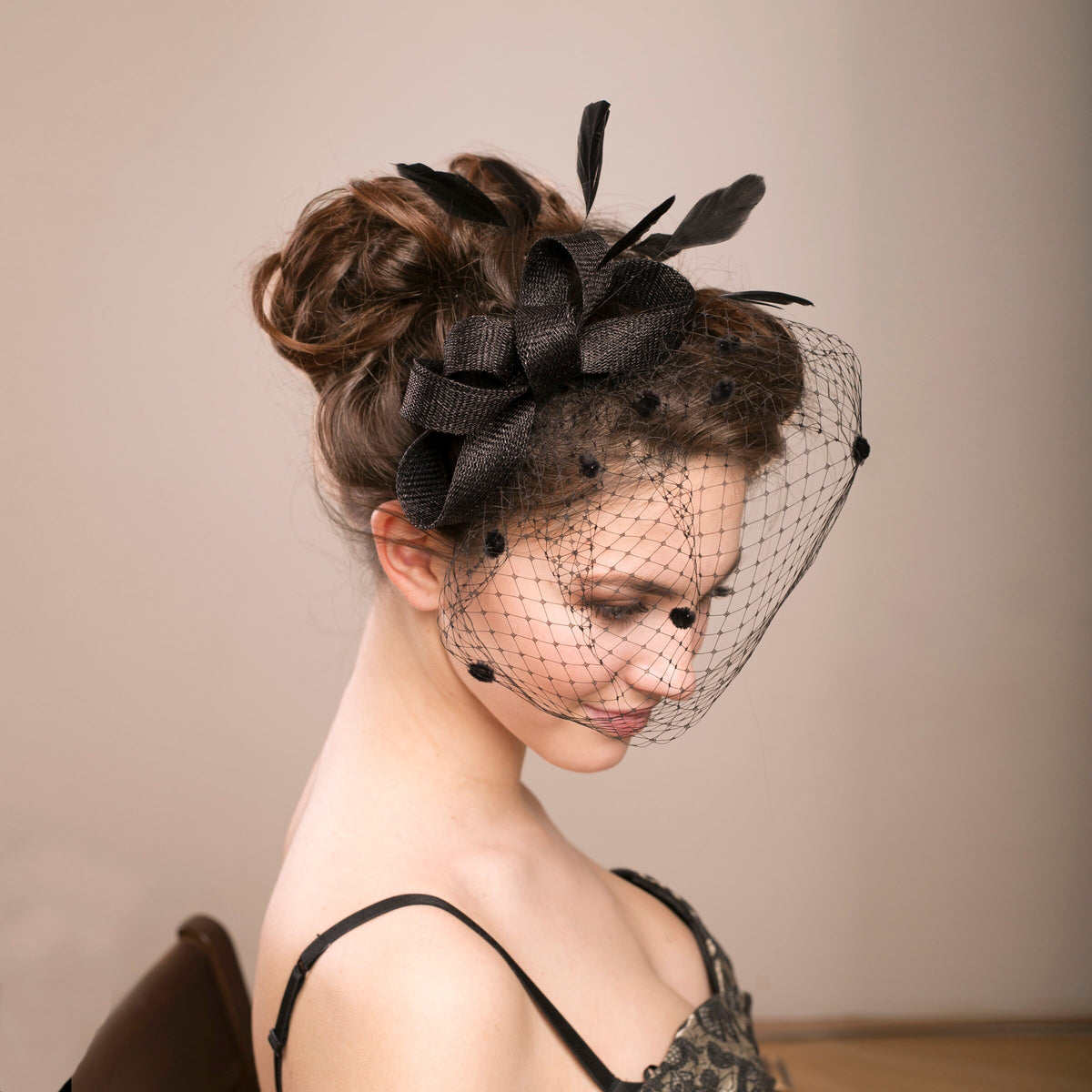 Black Feathered Fascinator with Birdcage Veil: Women's Elegant Headpiece