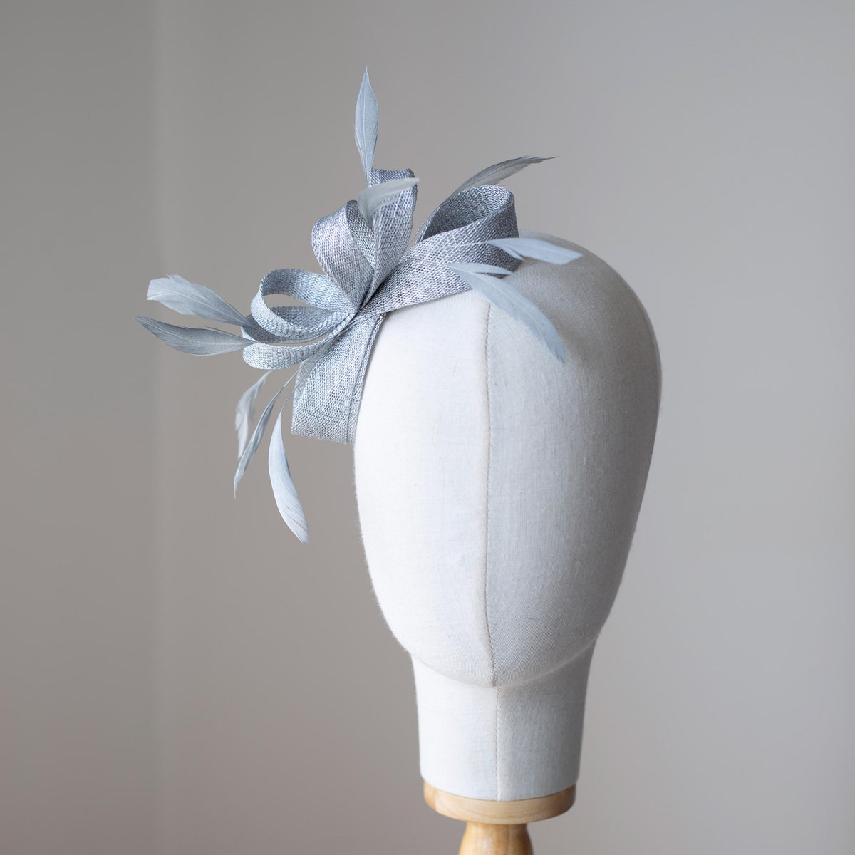 Metallic Silver Bow Fascinator: Feather Wedding Headpiece for Formal Events, Wedding Guests, Ball Gown