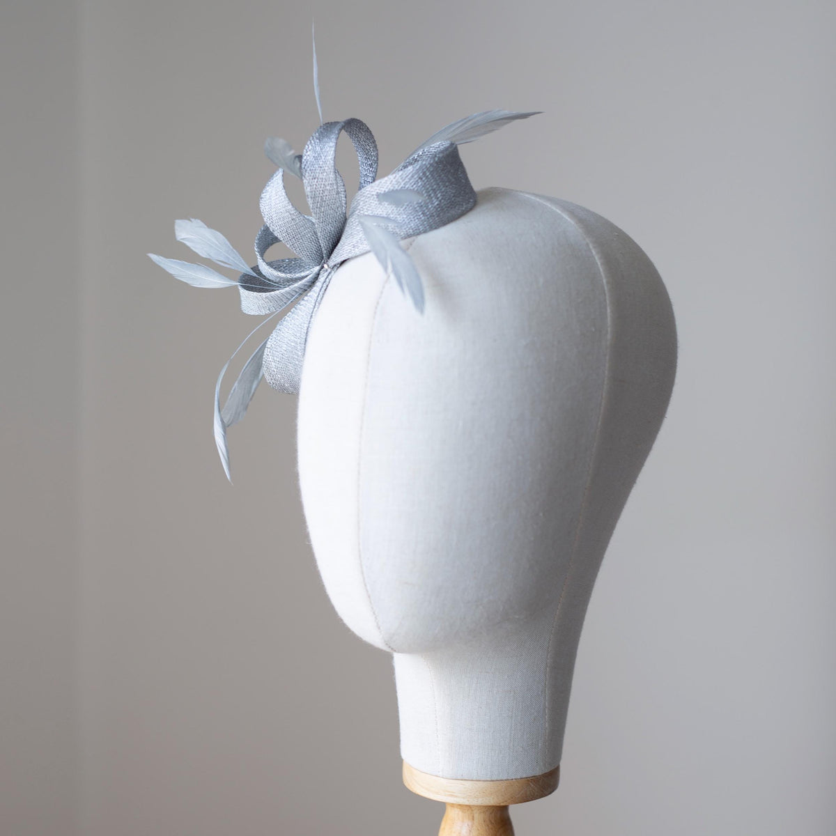 Metallic Silver Bow Fascinator: Feather Wedding Headpiece for Formal Events, Wedding Guests, Ball Gown
