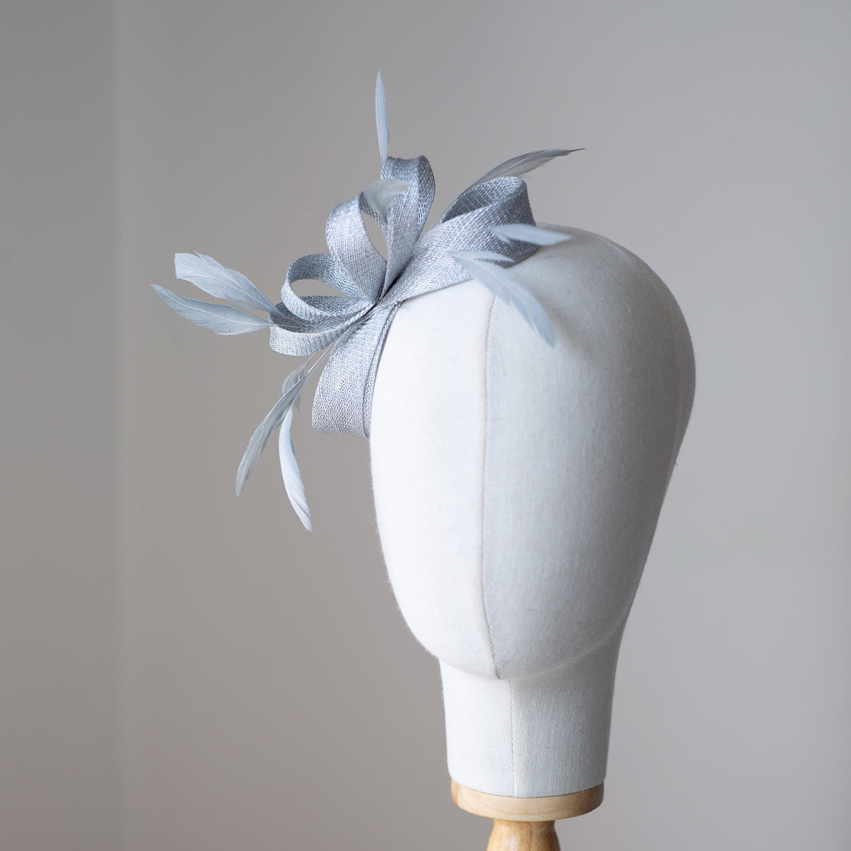 Metallic Silver Bow Fascinator: Feather Wedding Headpiece for Formal Events, Wedding Guests, Ball Gown